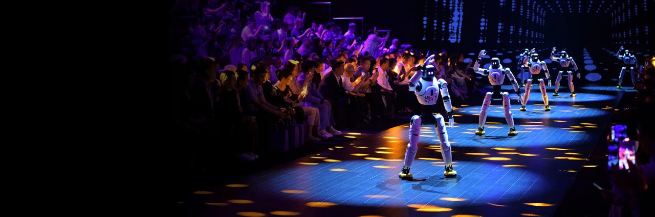 Humanoid robots perform at the 2026 Tianjin Fashion Week.